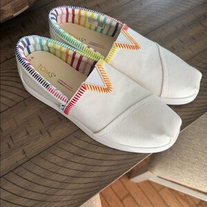 Tom’s with rainbow stitching